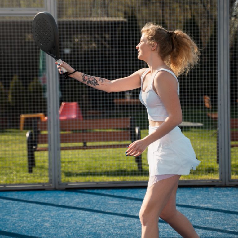 pickleball white female action